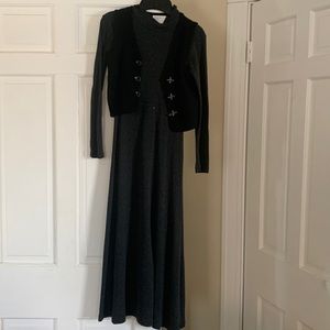 Grey long sleeve dress with black vest.  Very chic